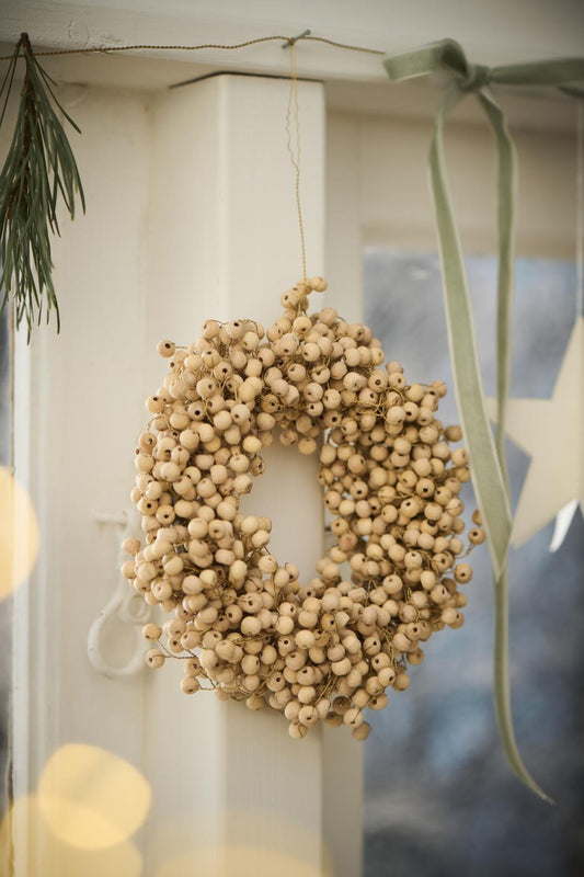 Petite couronne de perles de bois